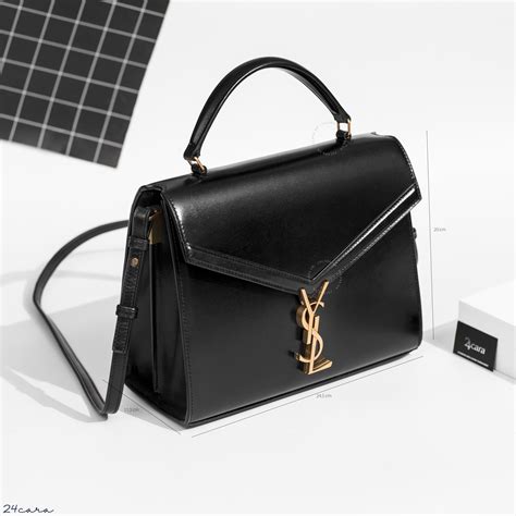 ysl cassandre tasche|CASSANDRA Medium top handle bag in grain de poudre .